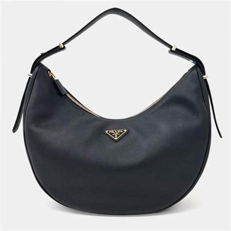 prada arche|Prada shoulder bag.